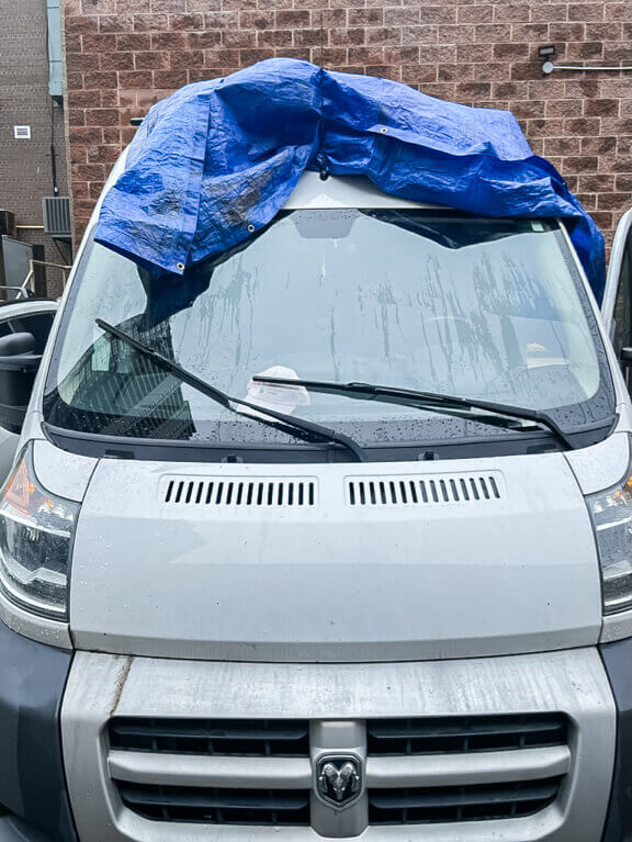 Betty White tarp cover due to roof leaking
