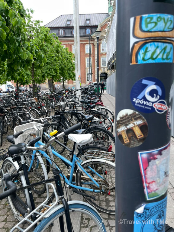 Travel with TMc Sticker in front of Copenhagen Train Station Bikes