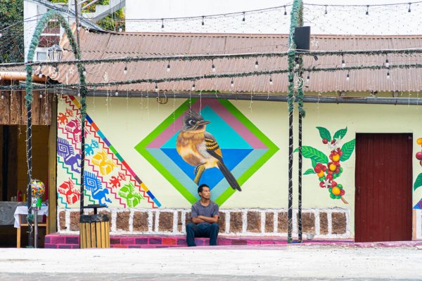 Lake Atitlán - Man Under Street Art Mural