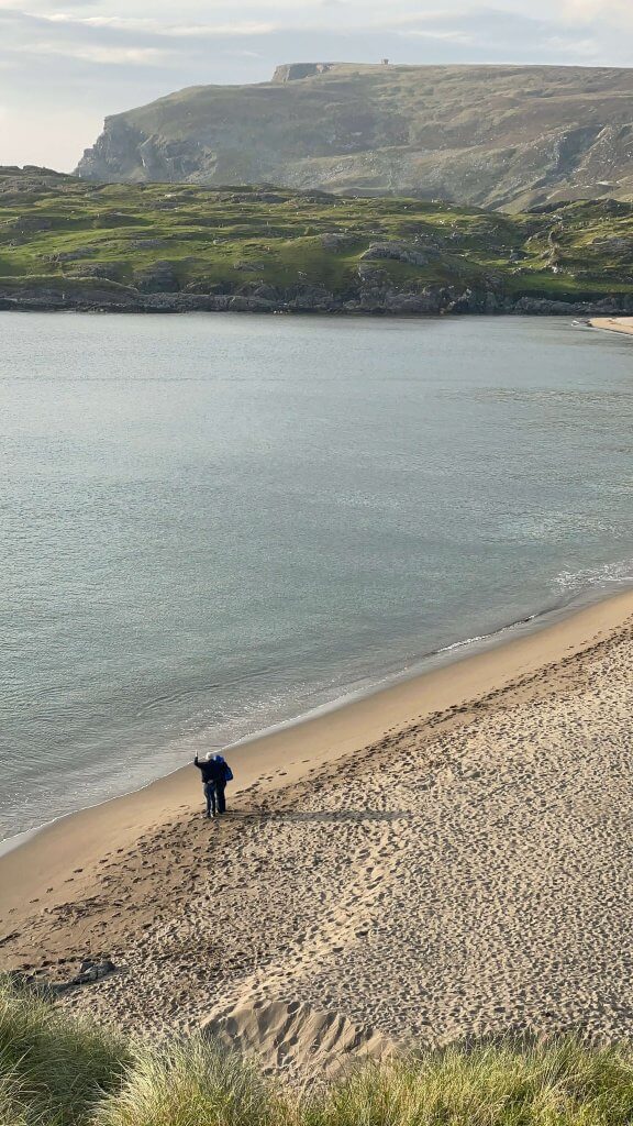 Oideas Gael - Couple on Beach in Glencolmcille